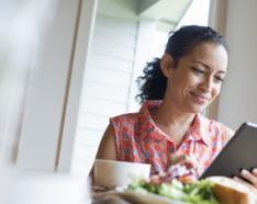 Woman looking at tablet