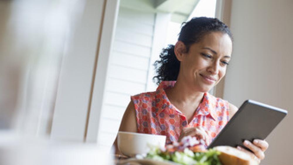 Woman looking at tablet